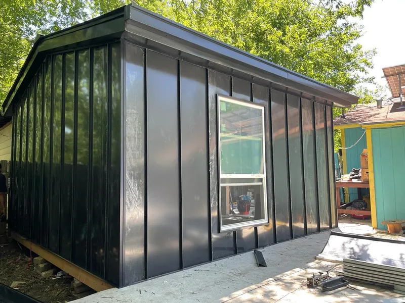 Black standing seam metal wall panels for Metal Roof Installation in Almena