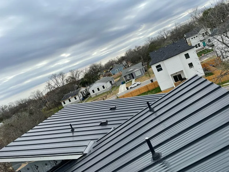 Standing seam metal roof panels with vents for Skylight Repair in Almena